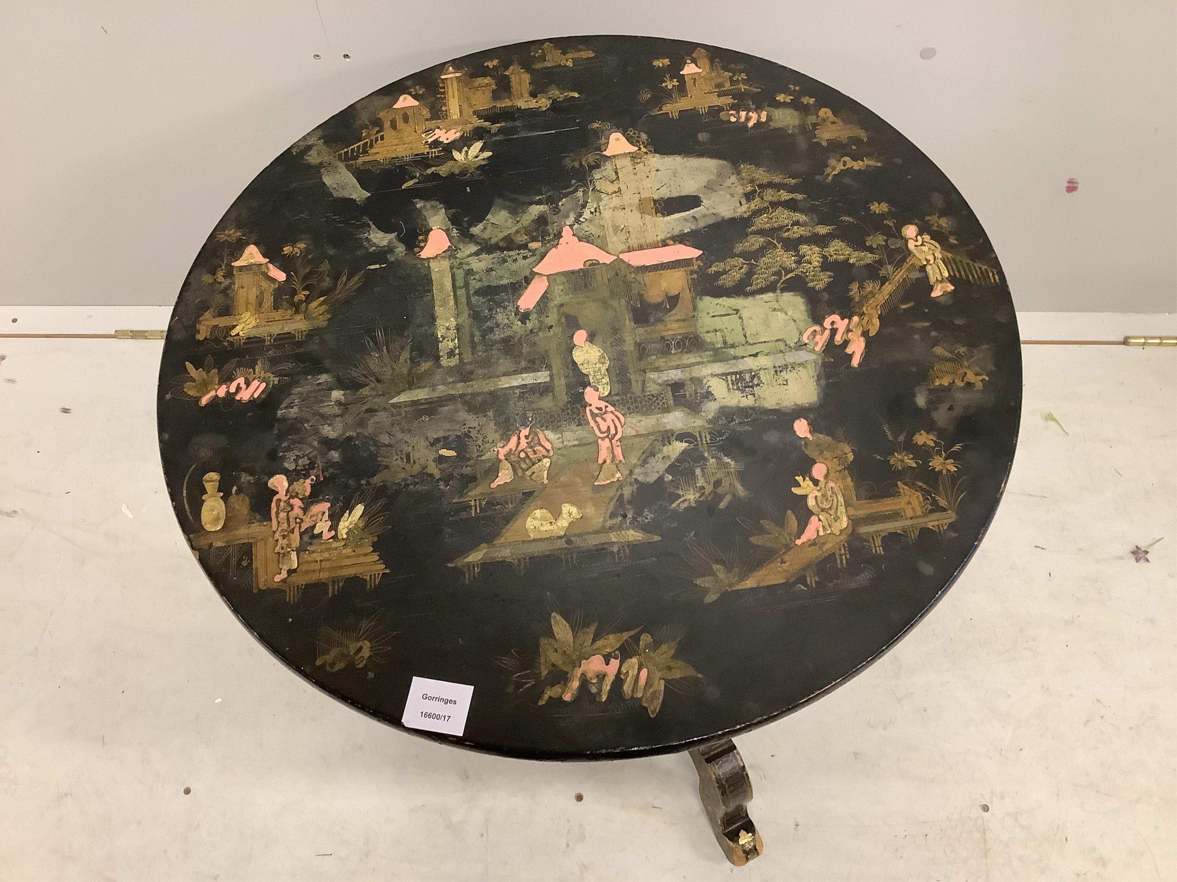 A 19th century chinoiserie lacquered circular tilt top tripod table, diameter 65cm, height 54cm, (reduced). Condition - poor